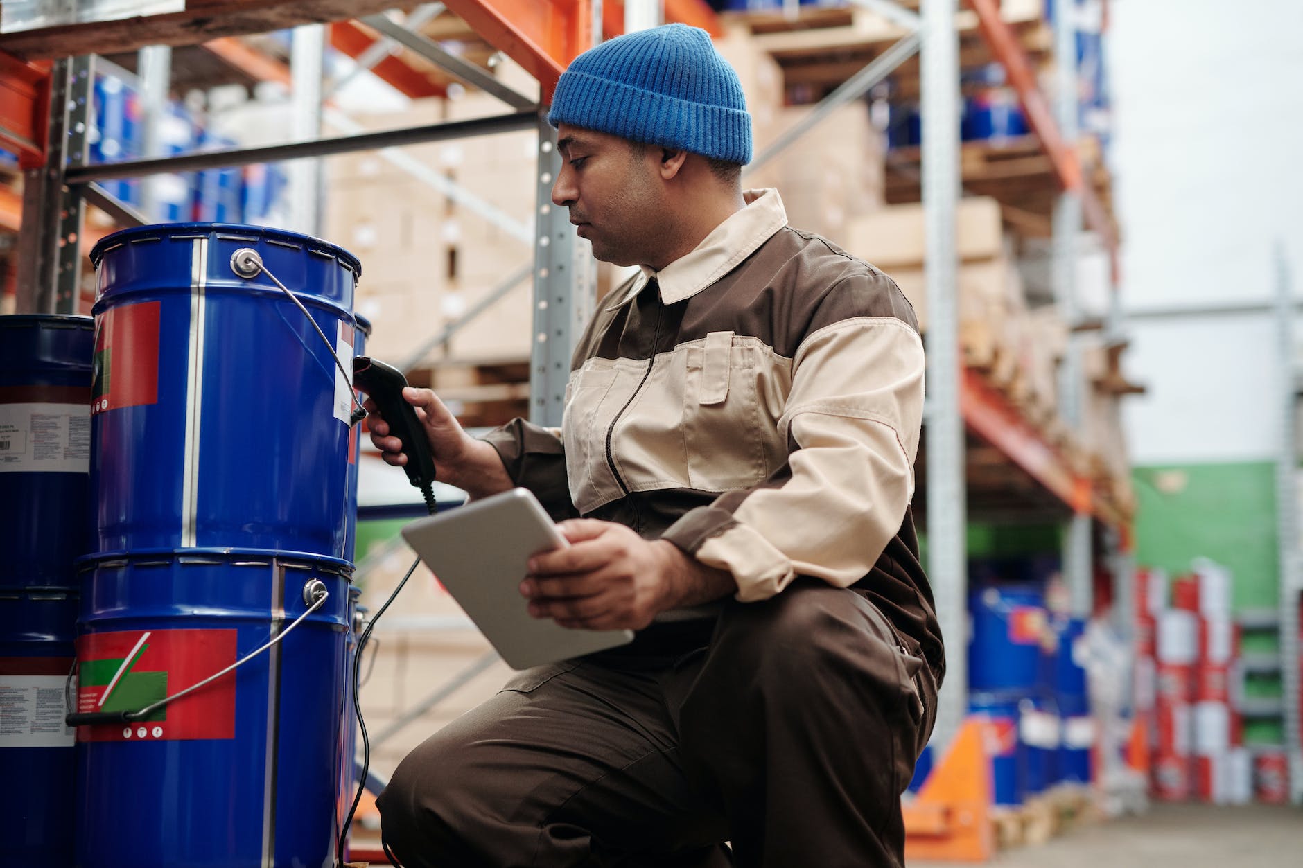 photo of man scanning a bucket